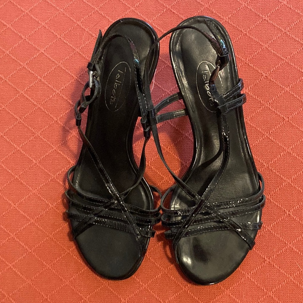 Patent leather black strappy sandals with a silver heel